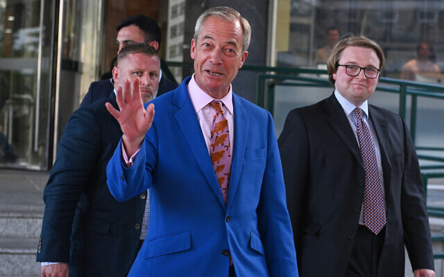 Britain's Reform UK leader Nigel Farage waves as he leaves Milbank Tower in London on July 7, 2026, after announcing he would resign and seek reelection. (AP Photo/Thomas Krych) Britain's Reform UK leader Nigel Farage waves as he leaves Milbank Tower in London on July 7, 2026, after announcing he would resign and seek reelection. (AP Photo/Thomas Krych)