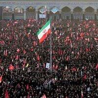 Mourners attend funeral prayers held as part of the dayslong funeral ceremonies for the late Iranian Supreme Leader Ayatollah Ali Khamenei in Qom, Iran, July 7, 2026. (Office of the Iranian Supreme Leader via AP)