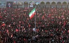 Mourners attend funeral prayers held as part of the dayslong funeral ceremonies for the late Iranian Supreme Leader Ayatollah Ali Khamenei in Qom, Iran, July 7, 2026. (Office of the Iranian Supreme Leader via AP)