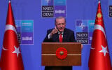 Turkish President Recep Tayyip Erdogan speaks during a media conference at the NATO summit in Ankara, Turkey, July 8, 2026. (AP Photo/Riza Ozel)