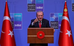 Turkish President Recep Tayyip Erdogan speaks during a media conference at the NATO summit in Ankara, Turkey, July 8, 2026. (AP Photo/Riza Ozel)