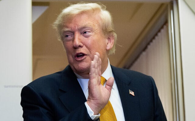 US President Donald Trump speaks with reporters in flight on Air Force One after landing at US Air Force Base at RAF Mildenhall, in Suffolk, Eastern England, July 8, 2026. (AP/Alex Brandon)