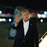 US President Donald Trump waves as he arrives on Air Force One, July 9, 2026, at Joint Base Andrews, Maryland. (AP/Alex Brandon)