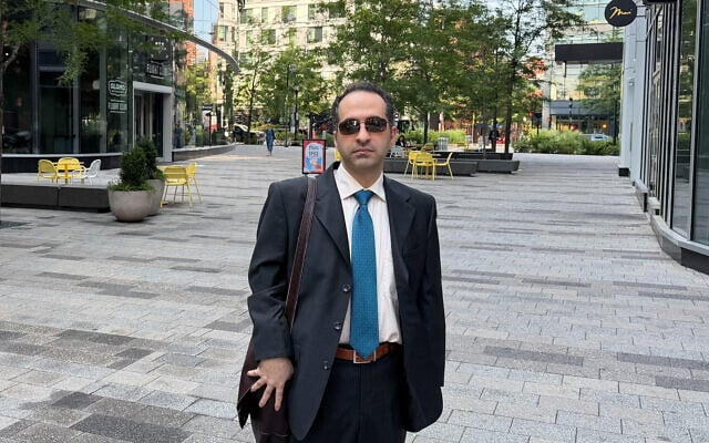 Iranian American defendant Mahdi Mohammad Sadeghi poses for a photo July 10, 2026, before heading into federal court in Boston. (AP/Michael Casey) Iranian American defendant Mahdi Mohammad Sadeghi poses for a photo July 10, 2026, before heading into federal court in Boston. (AP/Michael Casey)