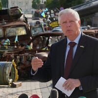 US Sen. Lindsey Graham, a South Carolina Republican. answers questions from the media near an exhibition of damaged Russian vehicles in central Kyiv, Ukraine, on July 10, 2026. (AP Photo/Efrem Lukatsky)
