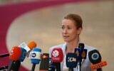 European Union foreign policy chief Kaja Kallas speaks with the media as she arrives for a meeting of EU foreign ministers in Brussels, July 13, 2026. (Marius Burgelman/AP)
