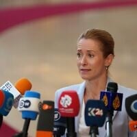 European Union foreign policy chief Kaja Kallas speaks with the media as she arrives for a meeting of EU foreign ministers in Brussels, July 13, 2026. (Marius Burgelman/AP)