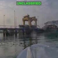 This image from video released by US Central Command, shows a view from a Corsair unmanned surface vessel, also called one-way attack surface drone, fired by US military, closing in on Bandar Abbas Naval Base, Iran, July 12, 2026. (US Central Command via AP)