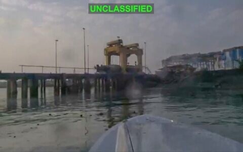 This image from video released by US Central Command, shows a view from a Corsair unmanned surface vessel, also called one-way attack surface drone, fired by US military, closing in on Bandar Abbas Naval Base, Iran, July 12, 2026. (US Central Command via AP)