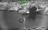 This image from video released by US Central Command shows an explosion at Bandar Abbas Naval Base, Iran, as three Corsair unmanned surface vessels, also called one-way attack surface drones, fired by the US military, hit the port July 12, 2026. (US Central Command via AP)
