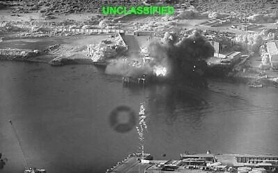 This image from video released by US Central Command shows an explosion at Bandar Abbas Naval Base, Iran, as three Corsair unmanned surface vessels, also called one-way attack surface drones, fired by the US military, hit the port July 12, 2026. (US Central Command via AP)
