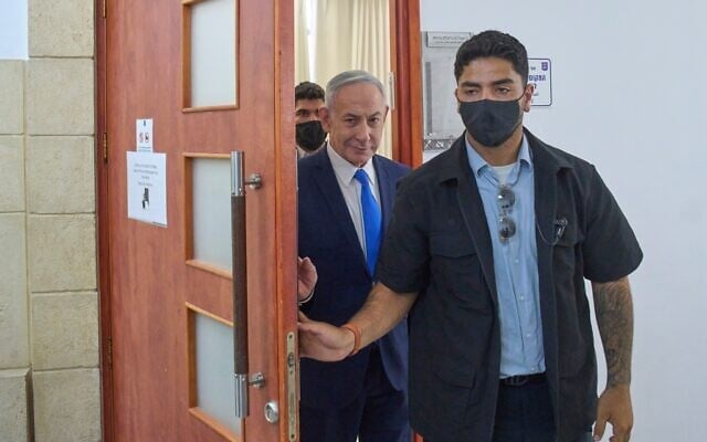 Prime Minister Benjamin Netanyahu leaves the courtroom after a hearing in his corruption trial at the Jerusalem District Court, July 15, 2026. (AP/Ohad Zwigenberg)