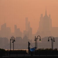 The New York City skyline is seen through a cover of wildfire smoke, in Jersey City, New Jersey, July 17, 2026 (AP Photo/Ryan Murphy)