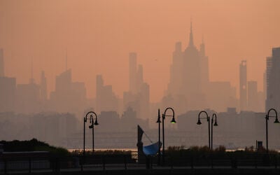 The New York City skyline is seen through a cover of wildfire smoke, in Jersey City, New Jersey, July 17, 2026. (AP/Ryan Murphy) The New York City skyline is seen through a cover of wildfire smoke, in Jersey City, New Jersey, July 17, 2026. (AP/Ryan Murphy)
