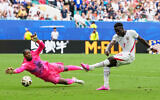 England’s Bukayo Saka shoots for goal during the World Cup third-place playoff soccer match between France and England in Miami Gardens, Florida, July 18, 2026. (AP/Rebecca Blackwell)
