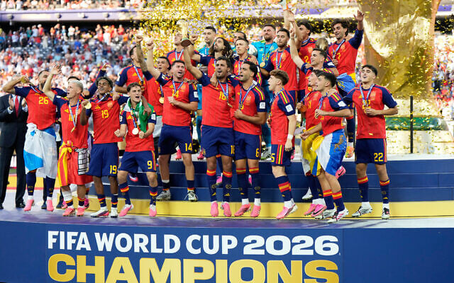 Spain’s team captain Rodri lifts the trophy after Spain won the World Cup final against Argentina in East Rutherford, N.J., near New York, July 19, 2026. (AP Photo/Ashley Landis)