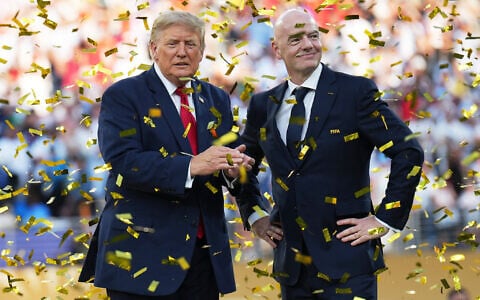 US President Donald Trump, left, and FIFA President Gianni Infantino watch confetti fall at the conclusion of the World Cup championship final soccer match between Spain and Argentina in East Rutherford, New Jersey, July 19, 2026. (AP Photo/Jacquelyn Martin)