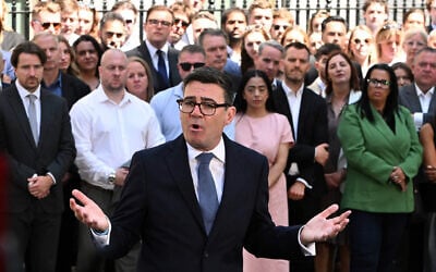 Britain’s new Prime Minister Andy Burnham speaks to staff and media at 10 Downing Street in London, July 20, 2026. (AP Photo/Thomas Krych)