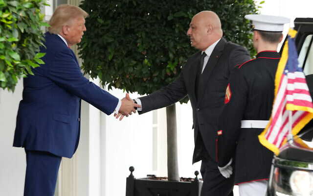 US President Donald Trump greets Lebanese President Joseph Aoun upon his arrival at the White House, July 21, 2026, in Washington. (AP Photo/Mark Schiefelbein)