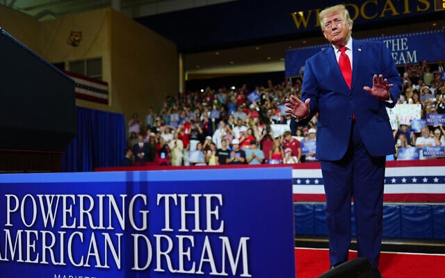 US President Donald Trump appears on stage at Wheeler High School, July 22, 2026, in Marietta, Ga. (AP/Julia Demaree Nikhinson)