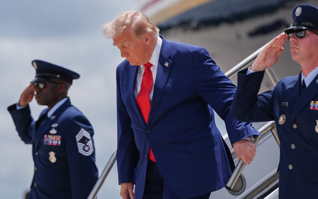 US President Donald Trump arrives on Air Force One at Dobbins Air Reserve Base, July 22, 2026, in Marietta, Ga. (AP Photo/Julia Demaree Nikhinson)