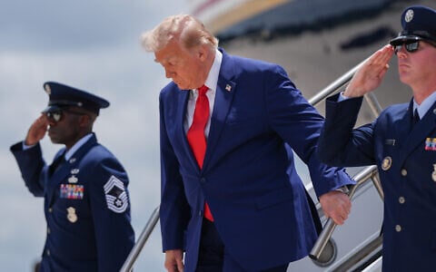 US President Donald Trump arrives on Air Force One at Dobbins Air Reserve Base, July 22, 2026, in Marietta, Ga. (AP Photo/Julia Demaree Nikhinson)