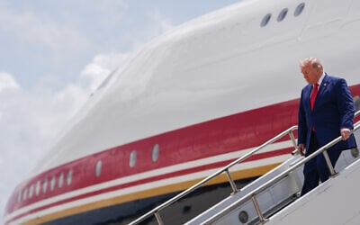 President Donald Trump disembarks Air Force One at Dobbins Air Reserve Base, July 22, 2026, in Marietta, Georgia. (AP Photo/Julia Demaree Nikhinson)