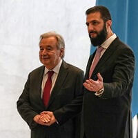 Syrian President Ahmad al-Sharaa, right, welcomes United Nations Secretary-General Antonio Guterres at the Syrian presidential palace in Damascus, Syria, July 25, 2026. (AP Photo/Omar Albam)