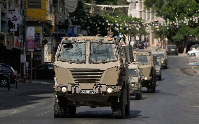 Israeli soldiers operate in the West Bank city of Nablus, July 26, 2026. (AP Photo/Majdi Mohammad)