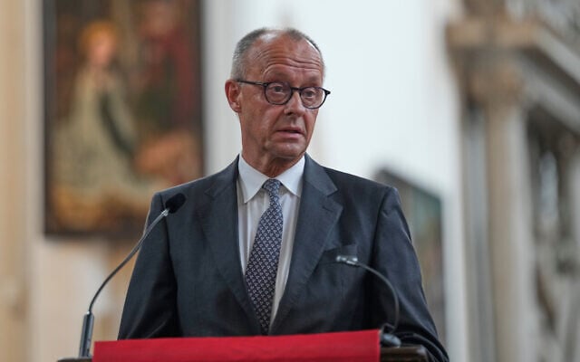German Chancellor Friedrich Merz attends a vigil for victims in the Pride March attack at St. Marien Church in Berlin, Germany, July 26, 2026. (AP Photo/ Markus Schreiber) German Chancellor Friedrich Merz attends a vigil for victims in the Pride March attack at St. Marien Church in Berlin, Germany, July 26, 2026. (AP Photo/ Markus Schreiber)