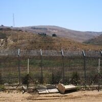 The border between Syria and the Israeli-controlled Golan Heights town of Majdal Shams is seen July 21, 2026. (AP Photo/Ariel Schalit)