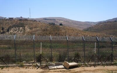 The border between Syria and the Israeli-controlled Golan Heights town of Majdal Shams is seen July 21, 2026. (AP Photo/Ariel Schalit)