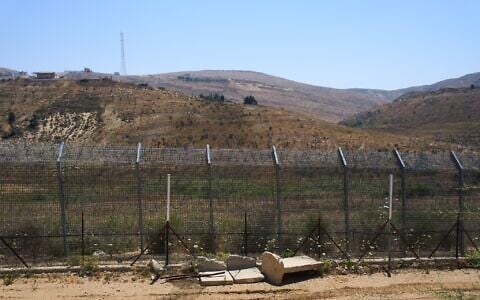 The border between Syria and the Israeli-controlled Golan Heights town of Majdal Shams is seen July 21, 2026. (AP Photo/Ariel Schalit)