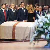US President Donald Trump, Vice President JD Vance, Treasury Secretary Scott Bessent, Eric Trump and his wife Lara,, White House Special Envoy to the Middle East Steve Witkoff and White House chief of staff Susie Wiles attend the funeral of senator Lindsey Graham at the Washington National Cathedral, July 28, 2026, in Washington. (AP Photo/Alex Brandon)