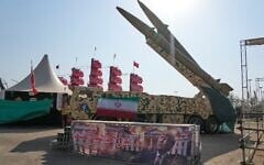 Iranian missiles are displayed by the armed forces as an anti-Trump banner declaring in English and Farsi, 'We will kill you,' is seen in a temporary exhibition at Azadi (Freedom) Square in Tehran, Iran, July 29, 2026. (AP Photo/Vahid Salemi)