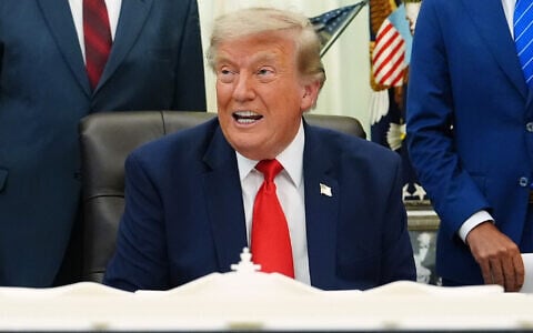 President Donald Trump speaks in the Oval Office of the White House about Dulles International Airport modernization, July 29, 2026, in Washington. (AP Photo/Julia Demaree Nikhinson)