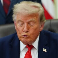 US President Donald Trump speaks in the Oval Office of the White House about Dulles International Airport modernization, July 29, 2026, in Washington. (AP/Julia Demaree Nikhinson)