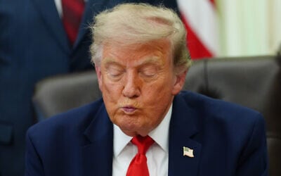 US President Donald Trump speaks in the Oval Office of the White House about Dulles International Airport modernization, July 29, 2026, in Washington. (AP/Julia Demaree Nikhinson)