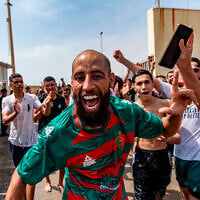 Migrants cross from Morocco into the Spanish enclave of Ceuta, July 30, 2026. (AP Photo/Antonio Sempere)