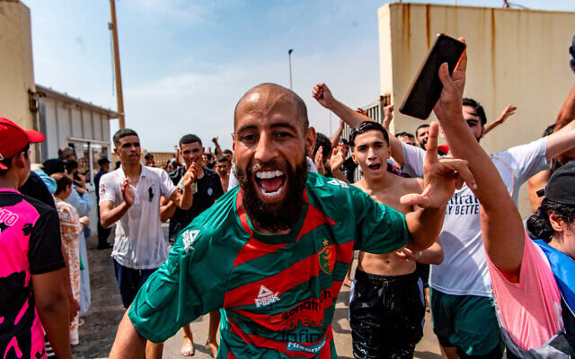 Migrants cross from Morocco into the Spanish enclave of Ceuta, July 30, 2026. (AP Photo/Antonio Sempere)