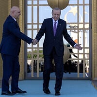 Turkish President Recep Tayyip Erdogan, right, shakes hands with his Lebanese counterpart Joseph Aoun before their meeting at the presidential palace in Ankara, Turkey, July 30, 2026. (Ugur Yildirim/DIA Photo via AP)