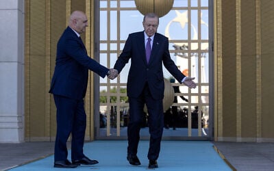 Turkish President Recep Tayyip Erdogan, right, shakes hands with his Lebanese counterpart Joseph Aoun before their meeting at the presidential palace in Ankara, Turkey, July 30, 2026. (Ugur Yildirim/DIA Photo via AP)