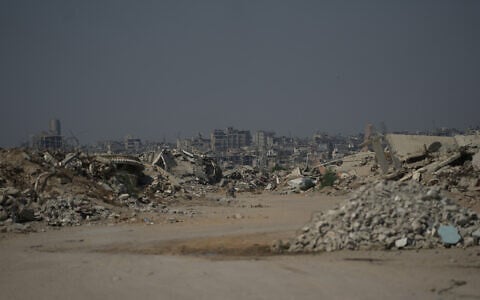 Buildings that were destroyed during the Israel Hamas war, in Khan Younis, southern Gaza Strip, July 31, 2026. (AP Photo/Abdel Kareem Hana)