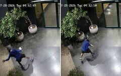 A masked assailant is caught on surveillance footage hurling a brick at the glass doors of Channel 12's offices in Tel Aviv, in the early hours of July 28, 2026. (Channel 12 via X)
