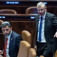 Communications Minister Shlomo Karhi (left) and Justice Minister Yariv Levin (right) attend a Knesset plenum session, January 8, 2025. (Yonatan Sindel/Flash90)
