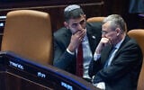 Communications Minister Shlomo Karhi (left) and Justice Minister Yariv Levin (right) attend a Knesset plenum session, January 8, 2025. (Yonatan Sindel/Flash90)