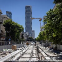 Construction of train tracks for the Tel Aviv Light Rail, on Allenby street in Tel Aviv. June 14, 2026 (Miriam Alster/Flash90)