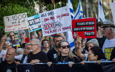 Protesters including former hostages and families of hostages demanding a state commission of inquiry march to Tel Aviv's Hostages Square during events marking the 1,000th day since the Hamas-led October 7, 2023, massacre, July 2, 2026. (Chaim Goldberg/Flash90) Protesters including former hostages and families of hostages demanding a state commission of inquiry march to Tel Aviv's Hostages Square during events marking the 1,000th day since the Hamas-led October 7, 2023, massacre, July 2, 2026. (Chaim Goldberg/Flash90)