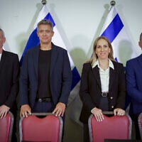 From left: MK Chili Tropper, former minister Yoaz Hendel, Shira Shapira, and Elyasaf Peretz hold a press conference announcing the formation of a new political party ahead of the upcoming elections, in Tel Aviv, on July 7, 2026. (Flash90)