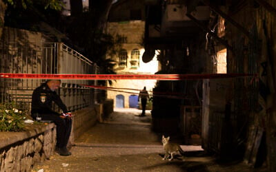 Police officers outside the scene of the murder of a 19-year-old man in the Nachlaot neighborhood of Jerusalem, July 11, 2026. (Chaim Goldberg/Flash90) Police officers outside the scene of the murder of a 19-year-old man in the Nachlaot neighborhood of Jerusalem, July 11, 2026. (Chaim Goldberg/Flash90)